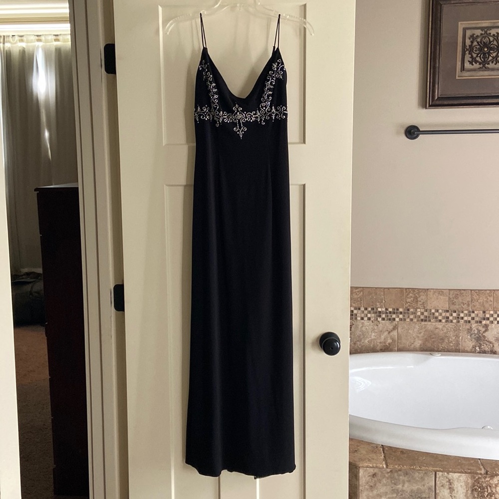 Black sequins gown. Dave & Johnny by Laura Ryner. Size 3/4.